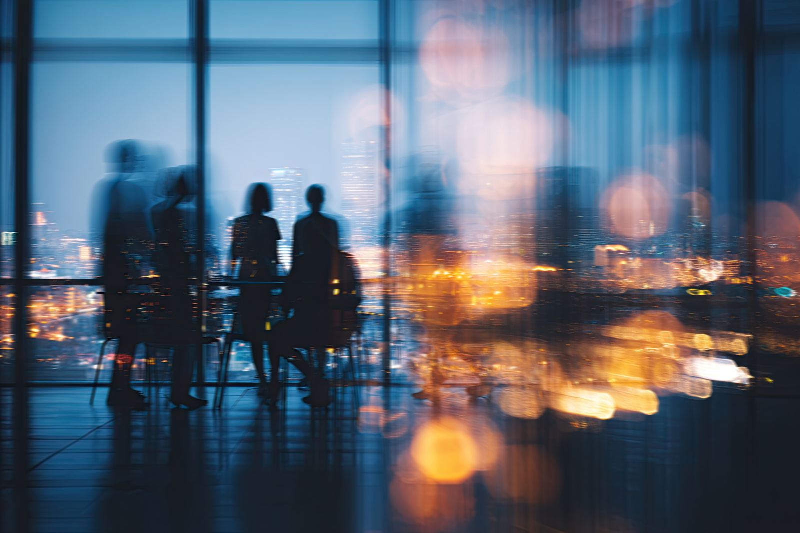 Advisory meeting overlooking a city skyline